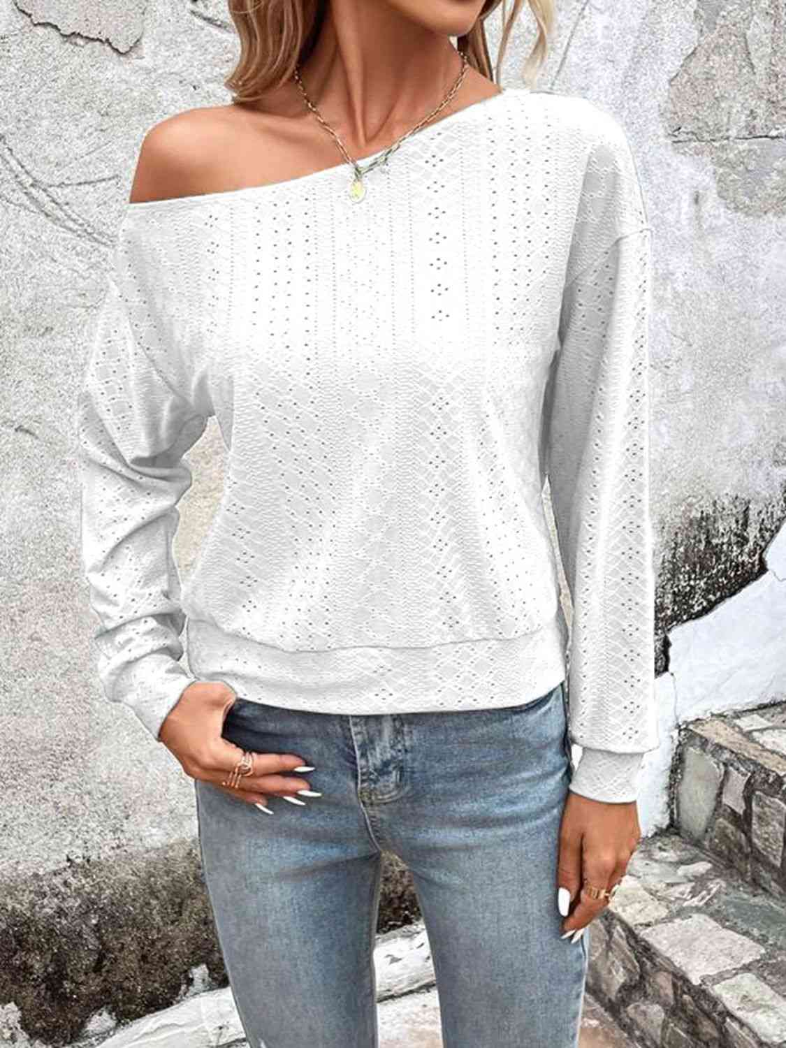 Eyelet dropped shoulder blouse.
