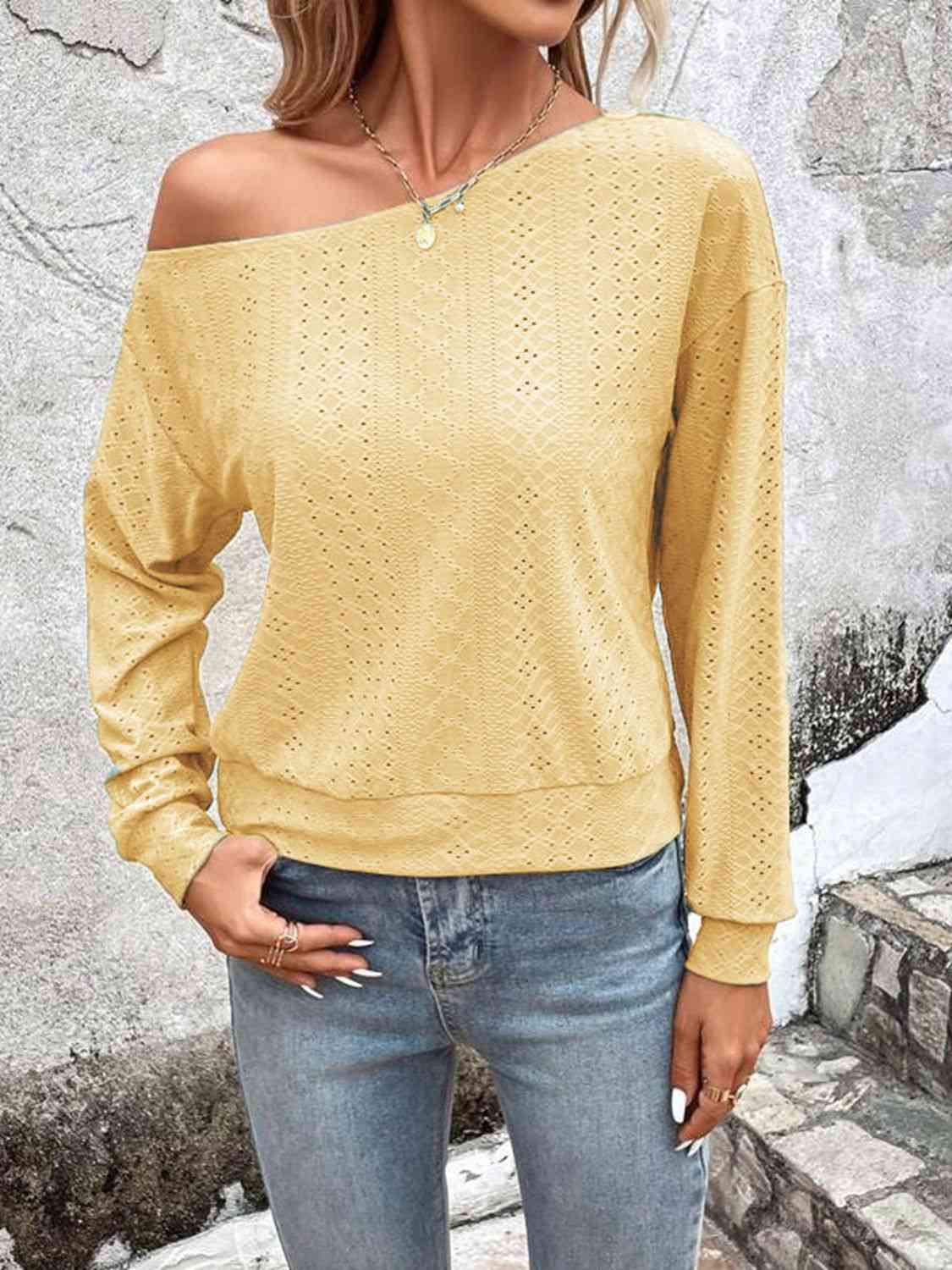 Eyelet dropped shoulder blouse.