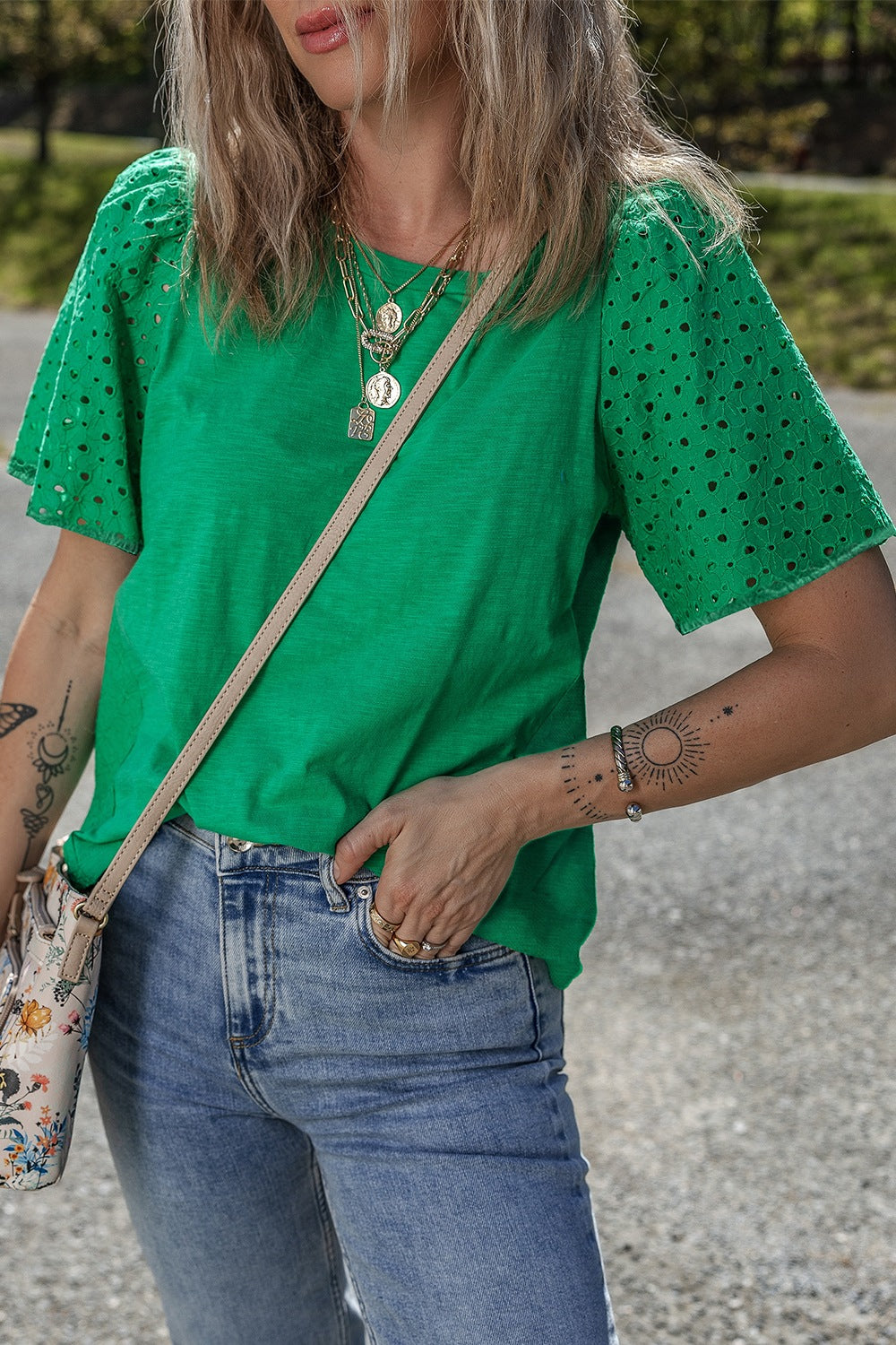 Eyelet embroidered patchwork top.