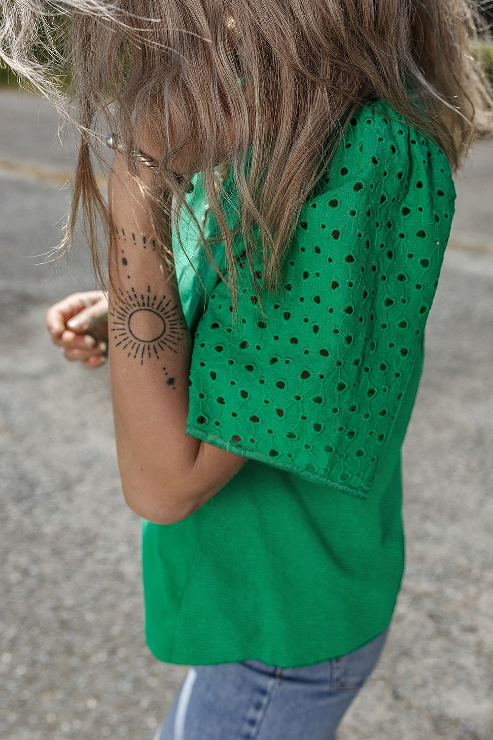 Eyelet embroidered patchwork top.