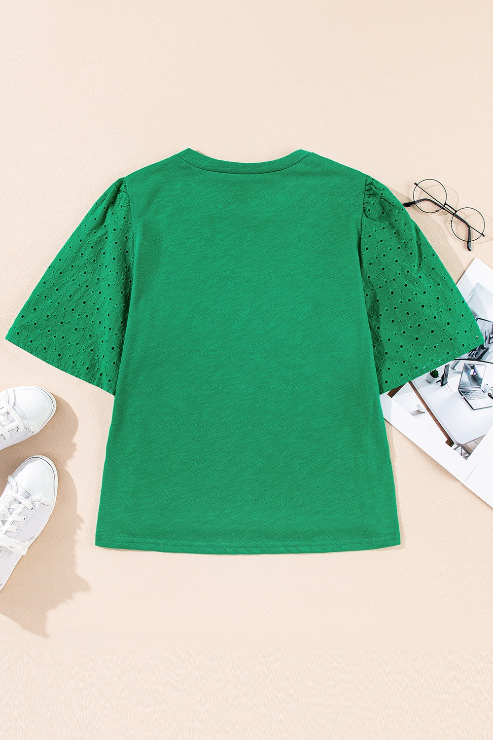 Eyelet embroidered patchwork top.