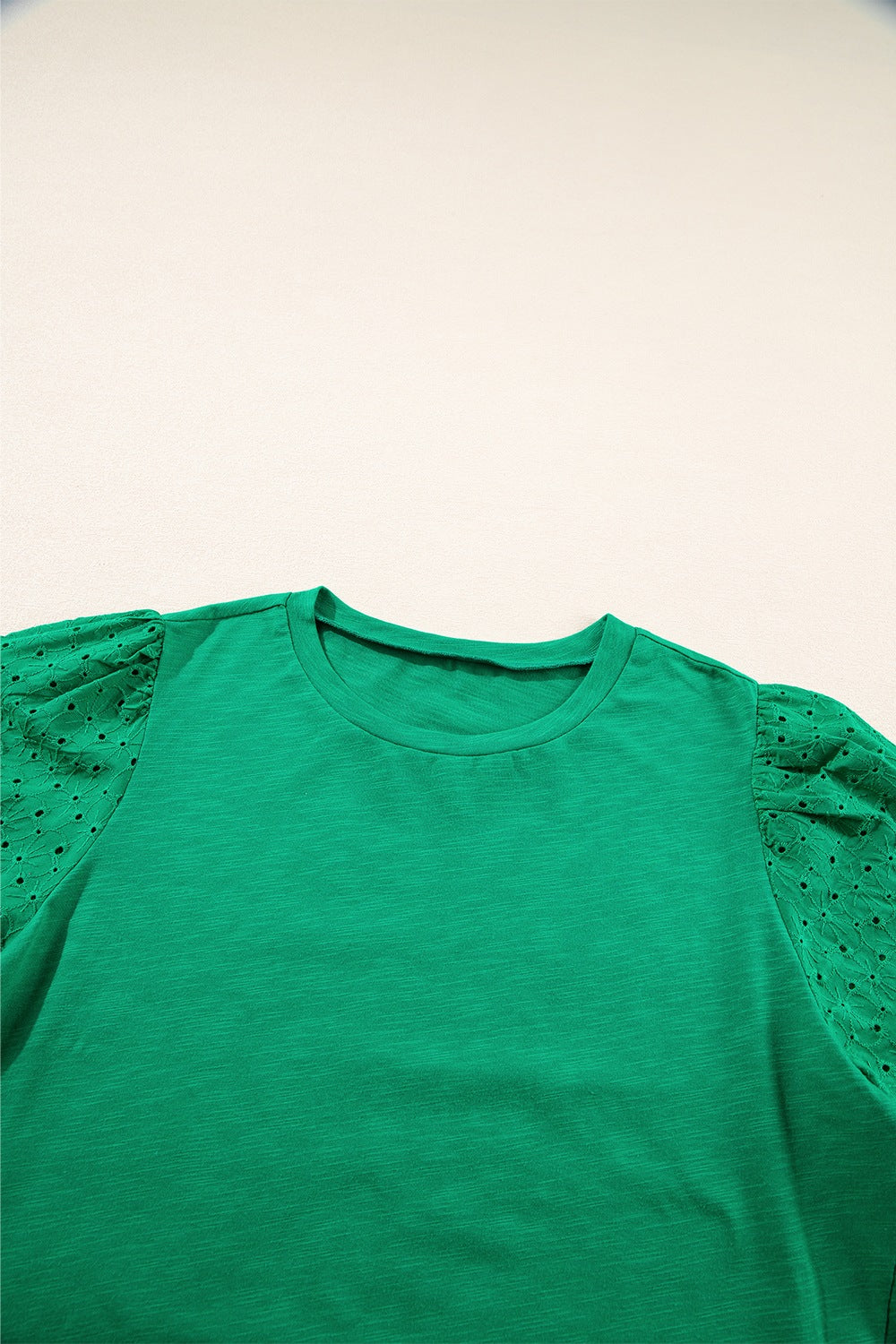 Eyelet embroidered patchwork top.