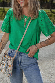 Eyelet embroidered patchwork top.