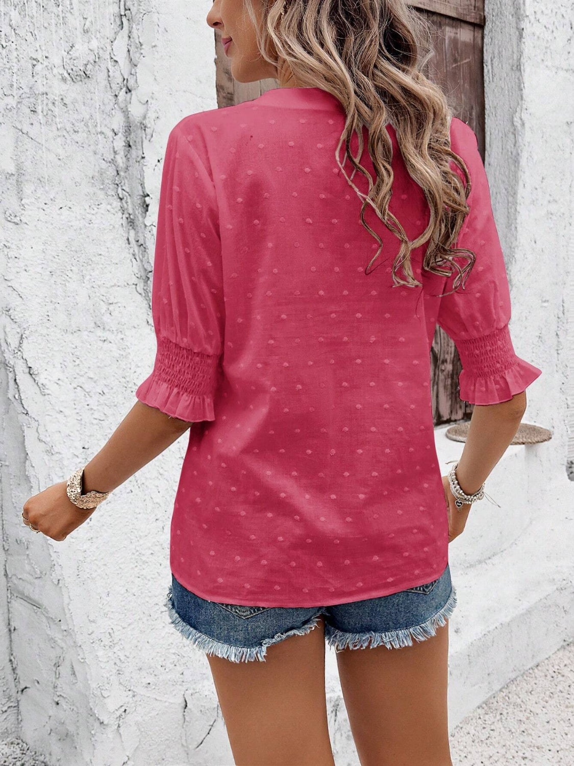 Eyelet notched flounce sleeve blouse.