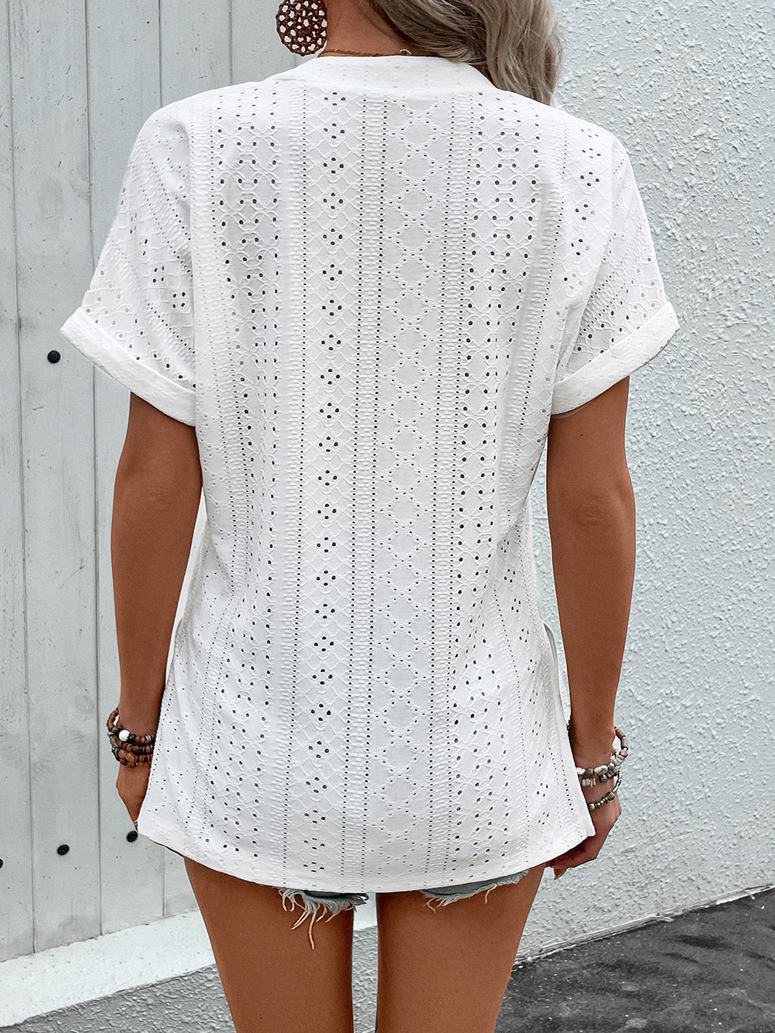 Perfee eyelet notched short sleeve blouse.