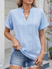 Eyelet notched short sleeve top.