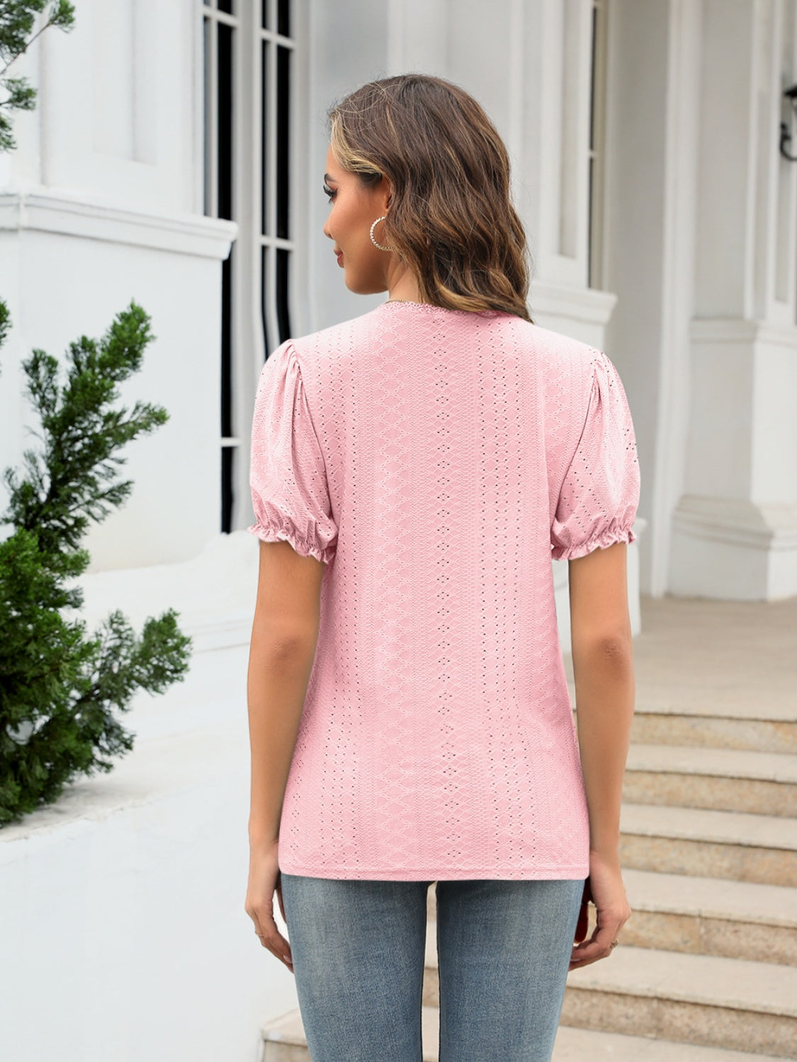Eyelet round neck short sleeve blouse with frill.