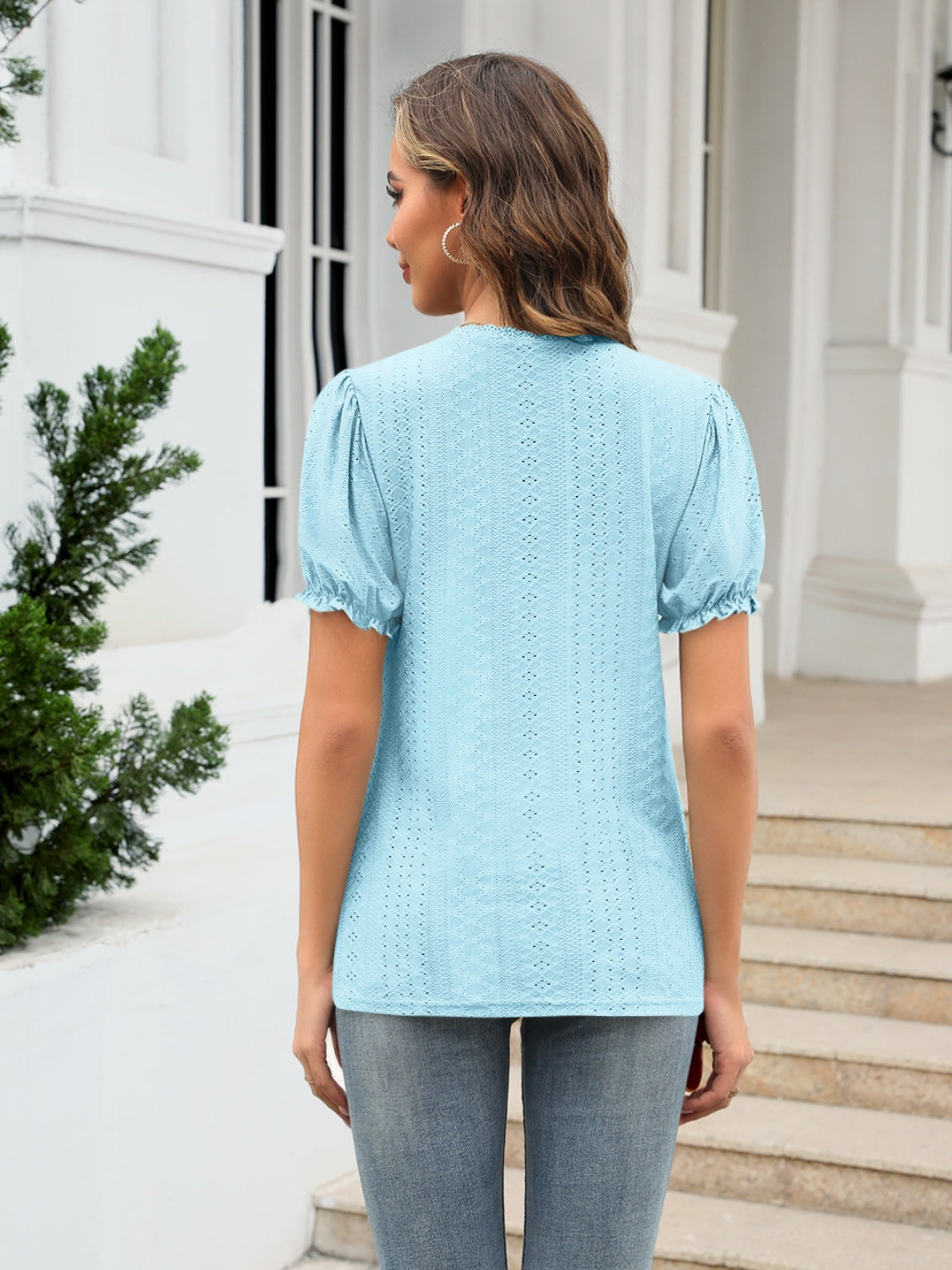 Eyelet round neck short sleeve blouse with frill.