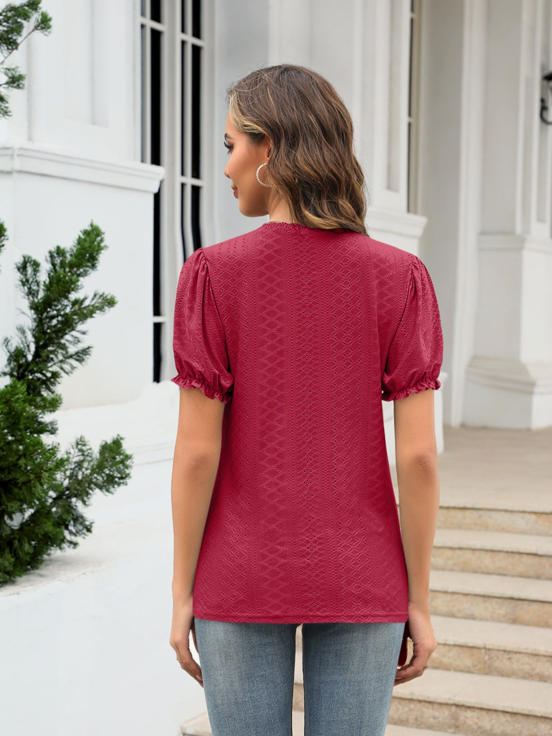 Eyelet round neck short sleeve blouse with frill.