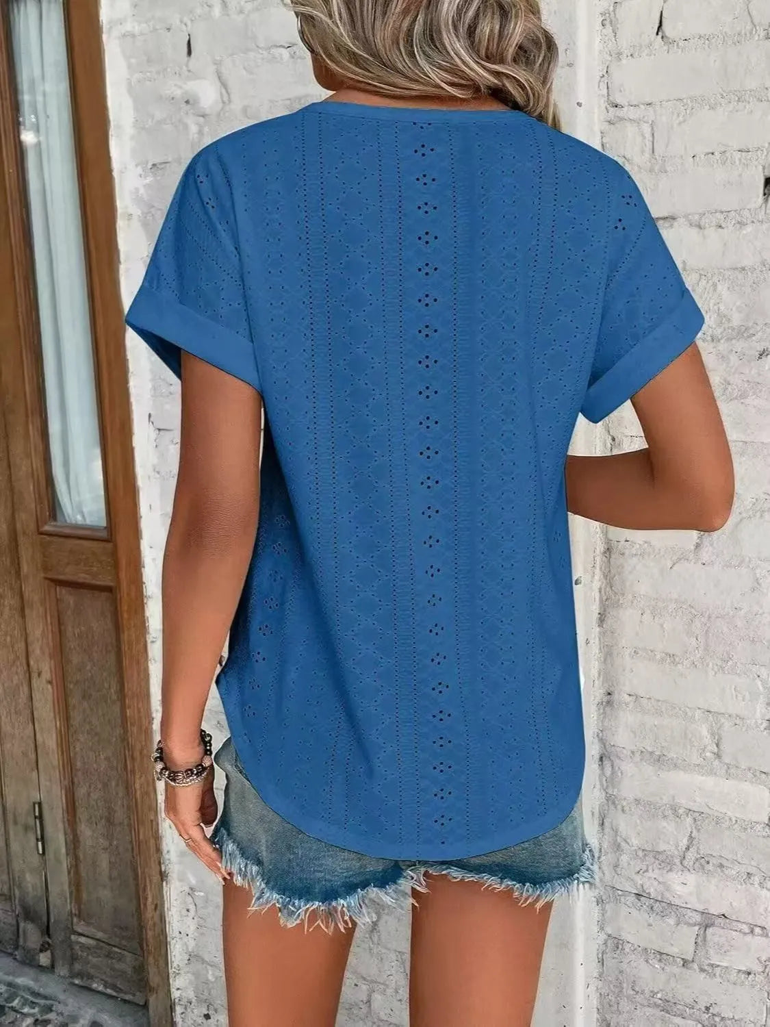 Eyelet round neck short sleeve top.