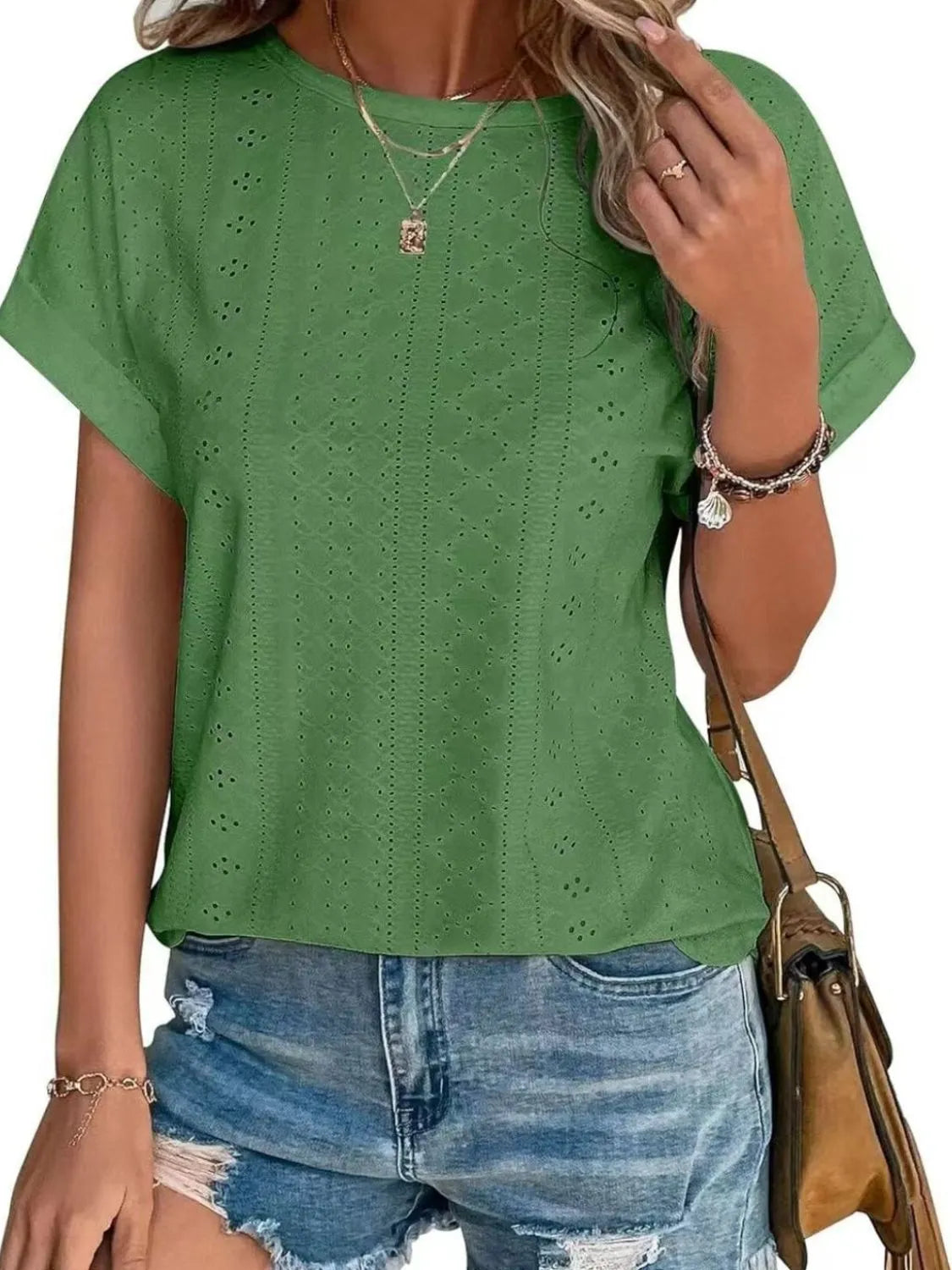Eyelet round neck short sleeve top.