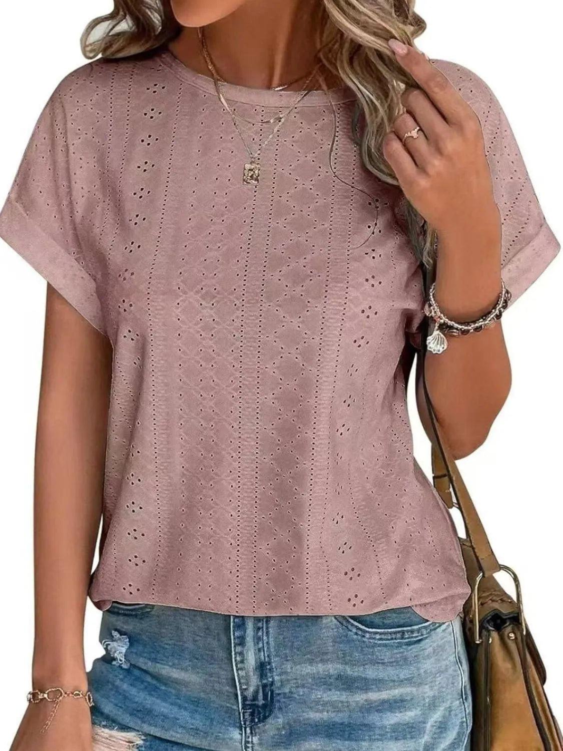 Eyelet round neck short sleeve top.