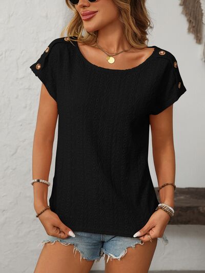 Mandy eyelet round neck short sleeve top with decorative buttons.