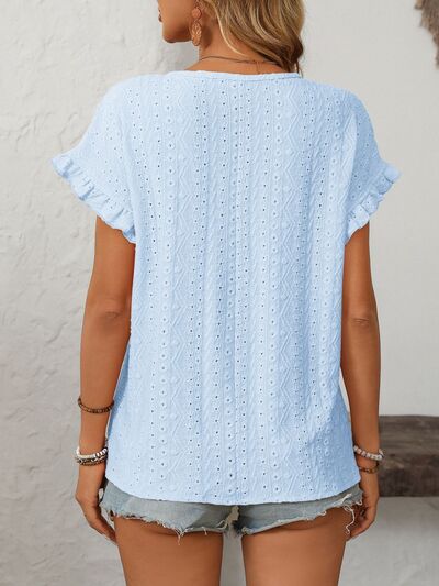 Mandy eyelet round neck short sleeve top with frill.