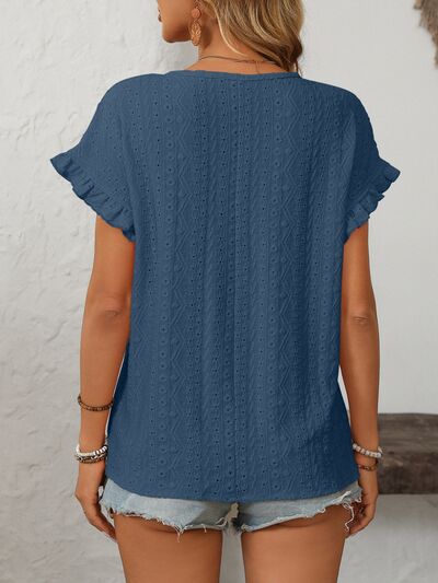 Mandy eyelet round neck short sleeve top with frill.