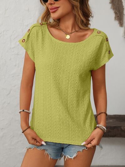 Mandy eyelet round neck short sleeve top with decorative buttons.