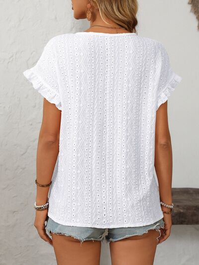 Mandy eyelet round neck short sleeve top with frill.