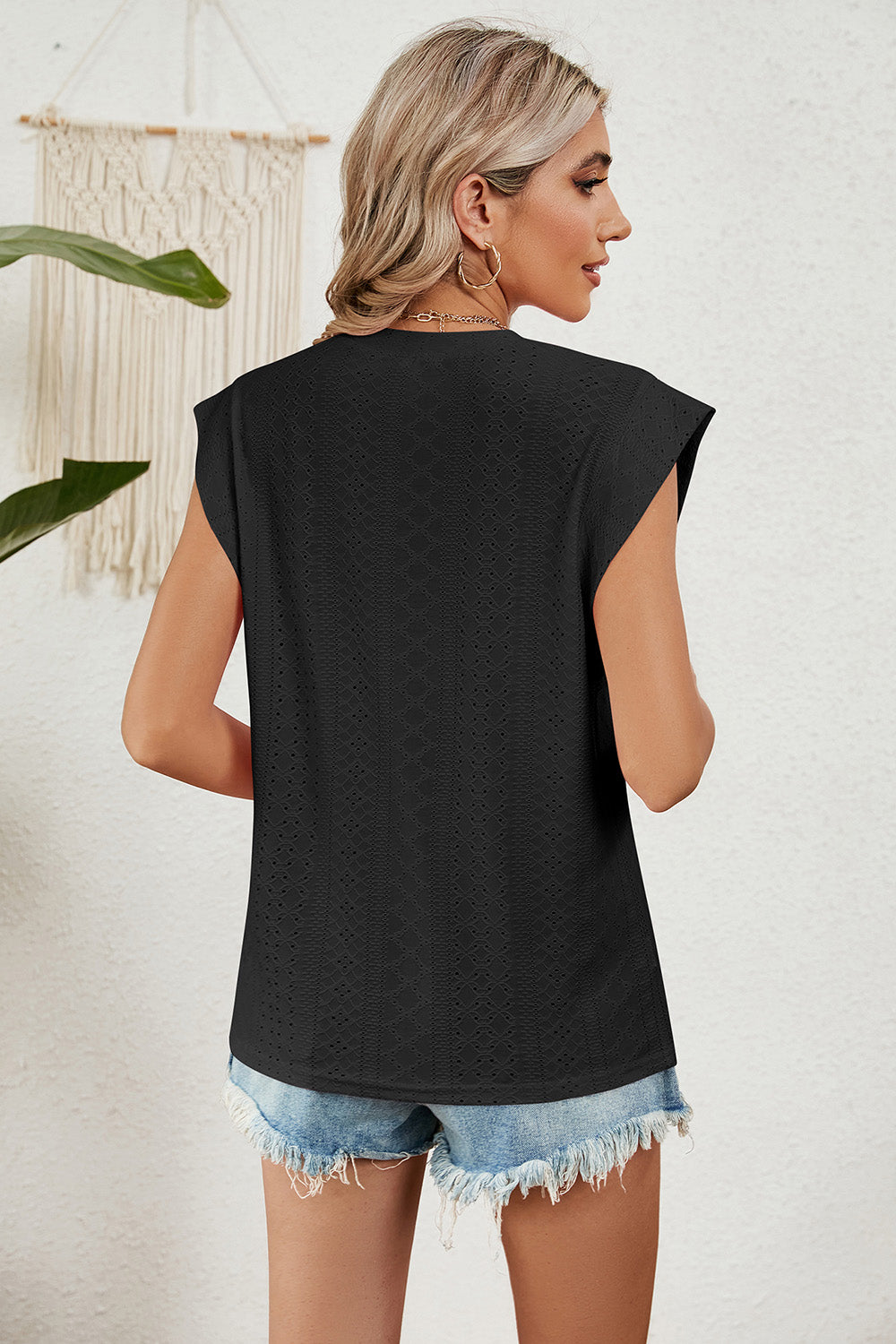 Eyelet round neck tank top.