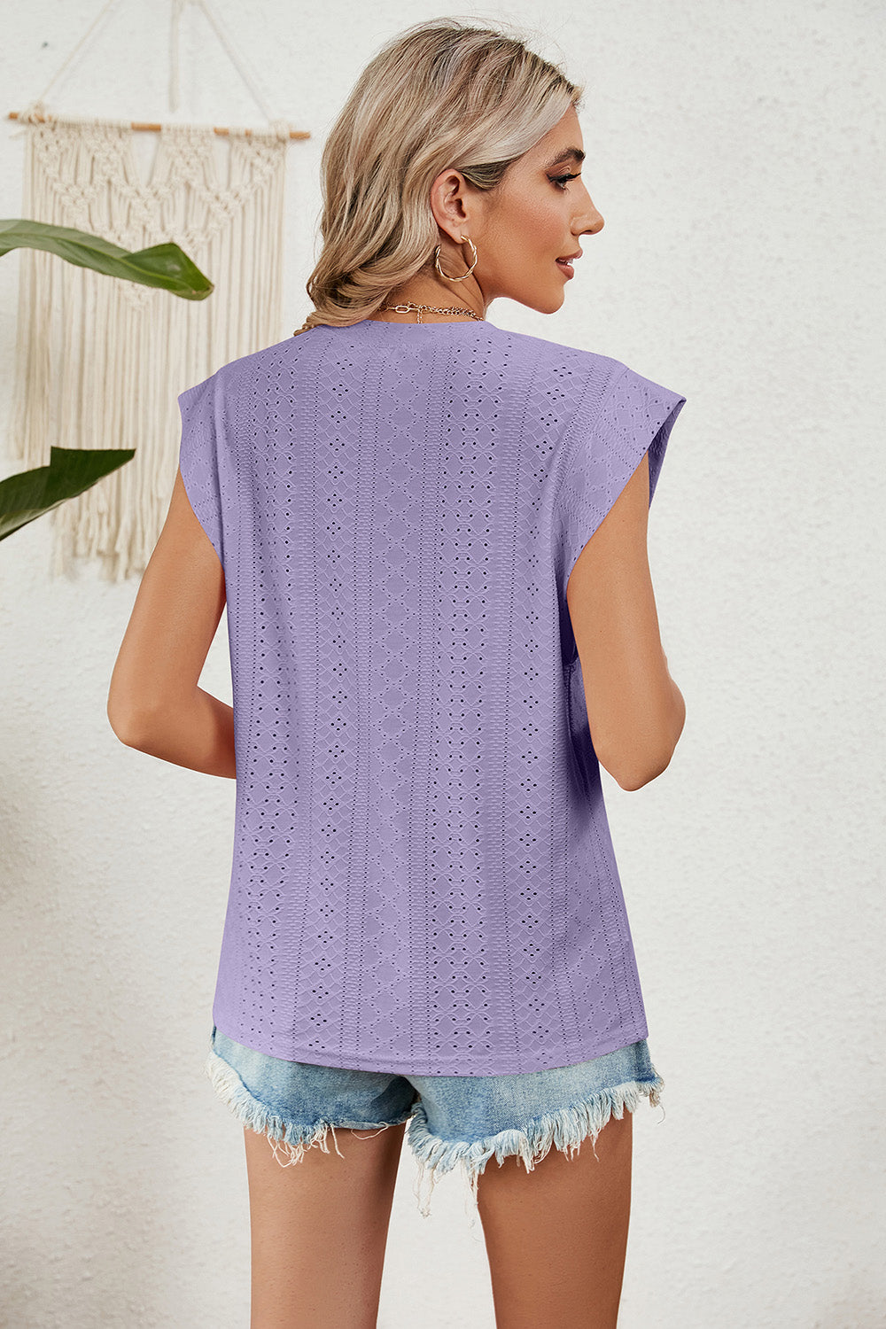 Eyelet round neck tank top.