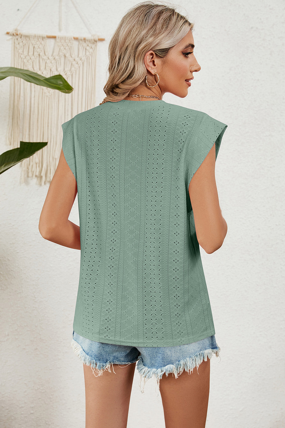 Eyelet round neck tank top.