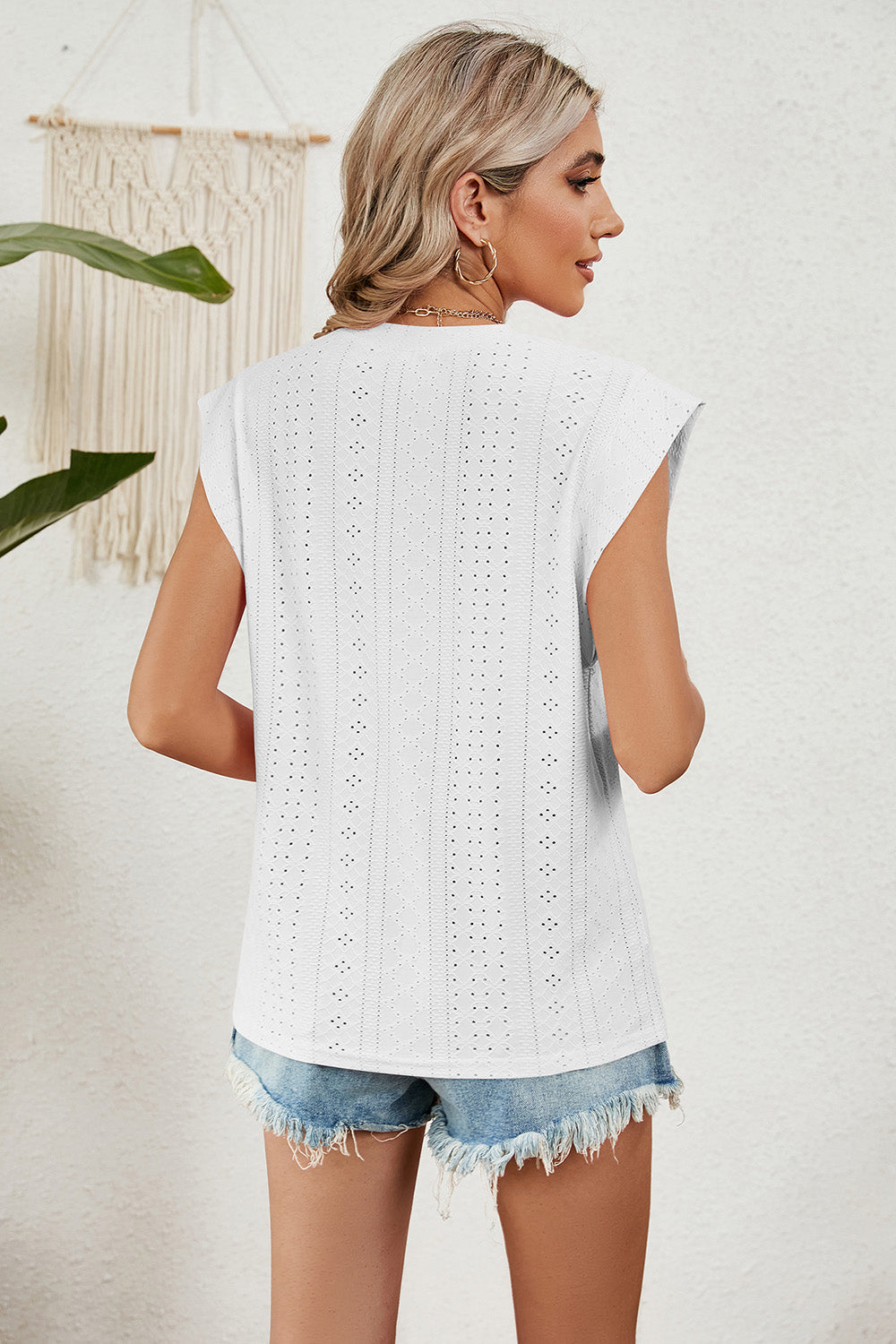 Eyelet round neck tank top.