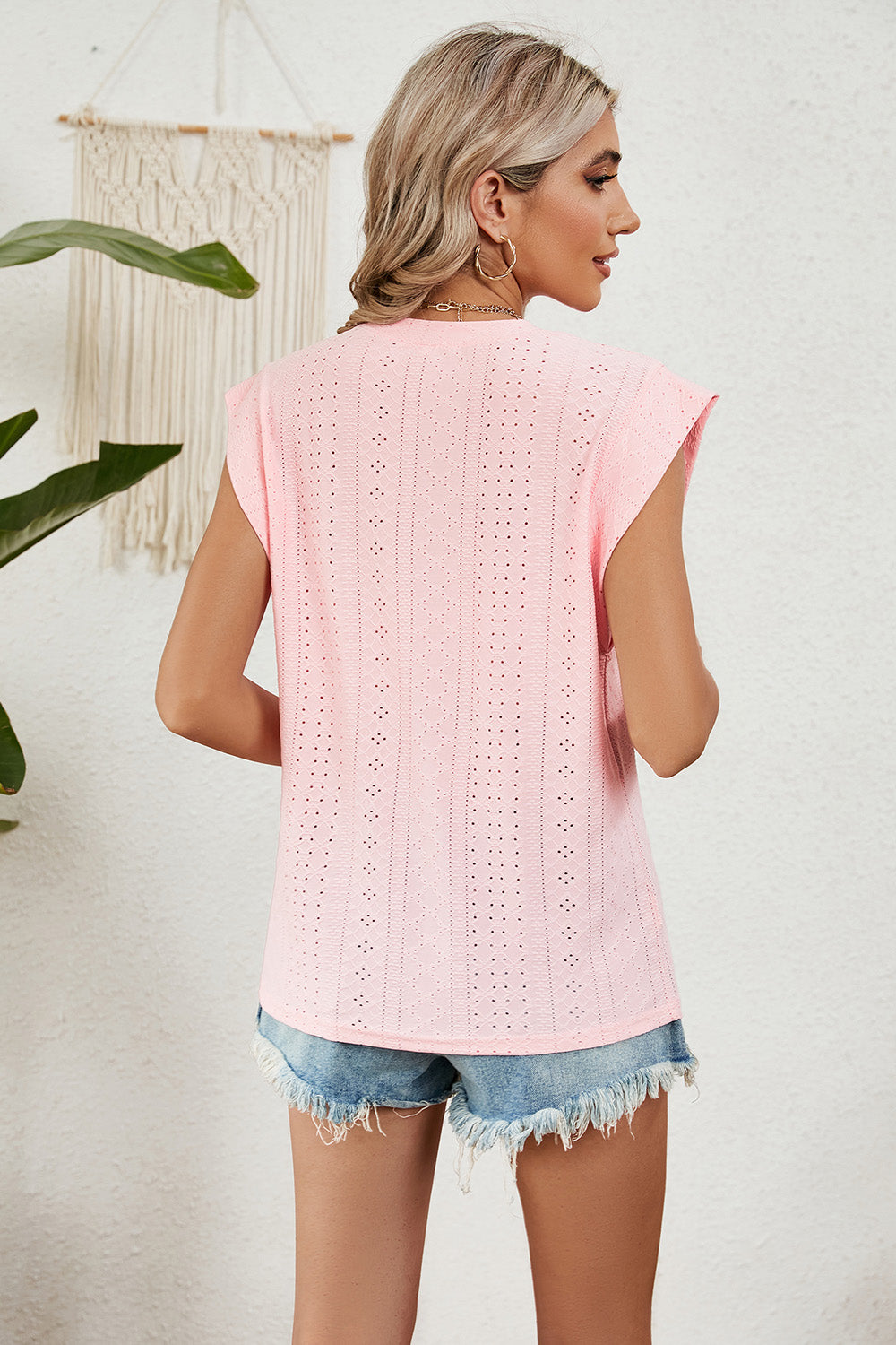 Eyelet round neck tank top.