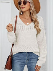Eyelet V-neck long sleeve sweater.