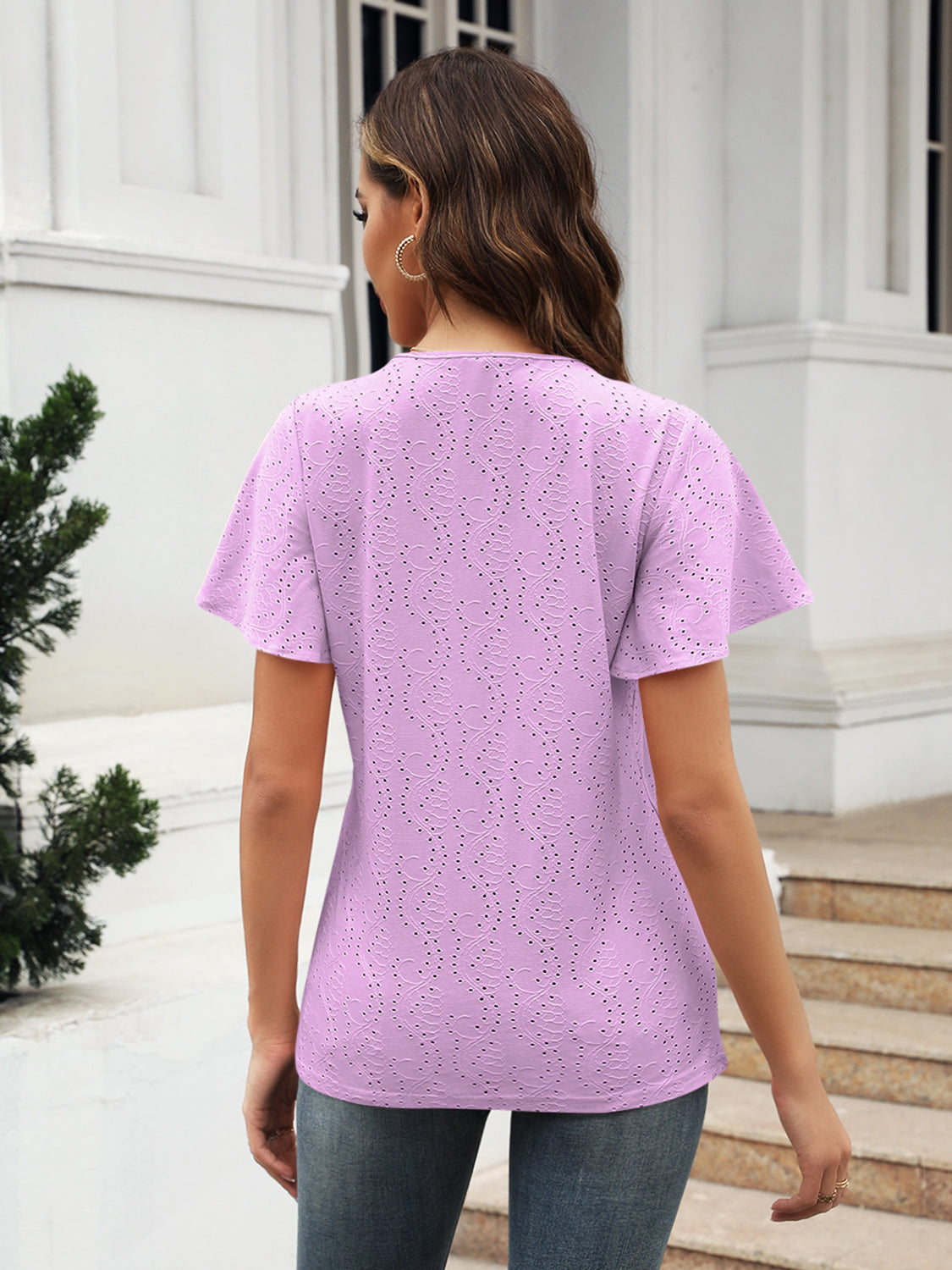 Eyelet V-neck short sleeve blouse.