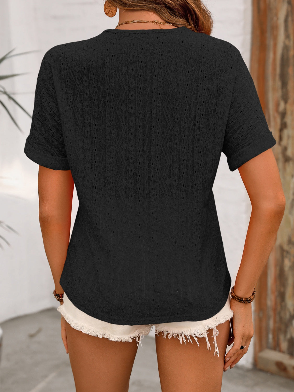 Ivy Lane eyelet V-neck short sleeve top.
