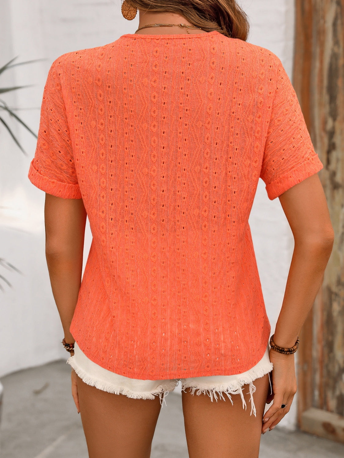 Ivy Lane eyelet V-neck short sleeve top.