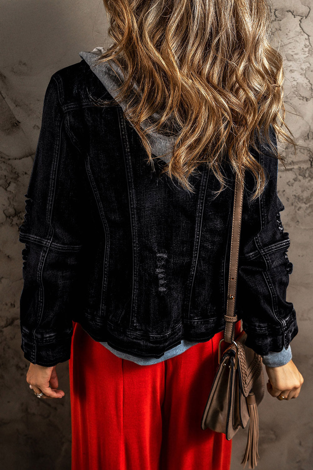 Distressed fake two-piece hooded zip-up denim jacket with buttoned pockets and drawstring.