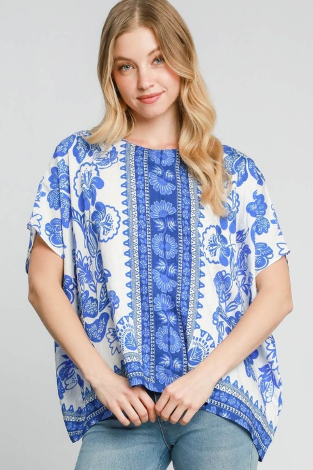 Umgee full size floral border print oversized top, plus size.