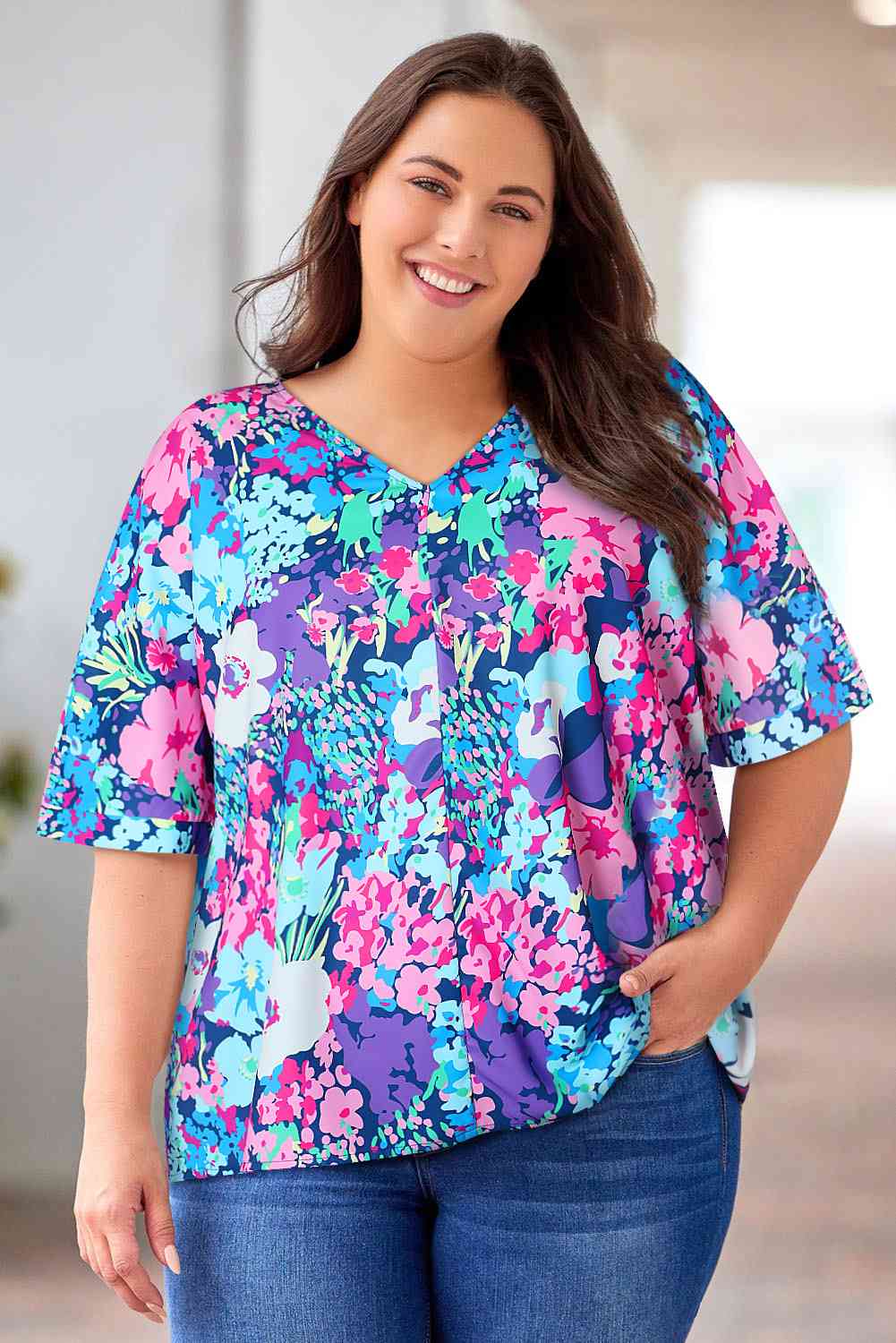 Floral center seam V-neck blouse.