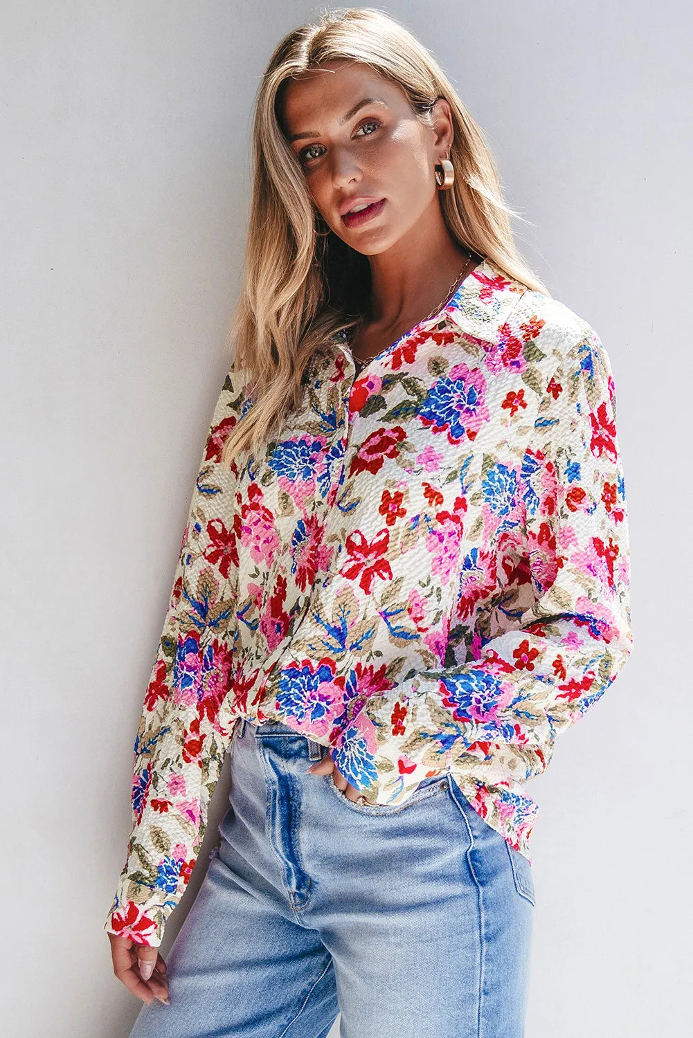 Floral collared neck long sleeve shirt.