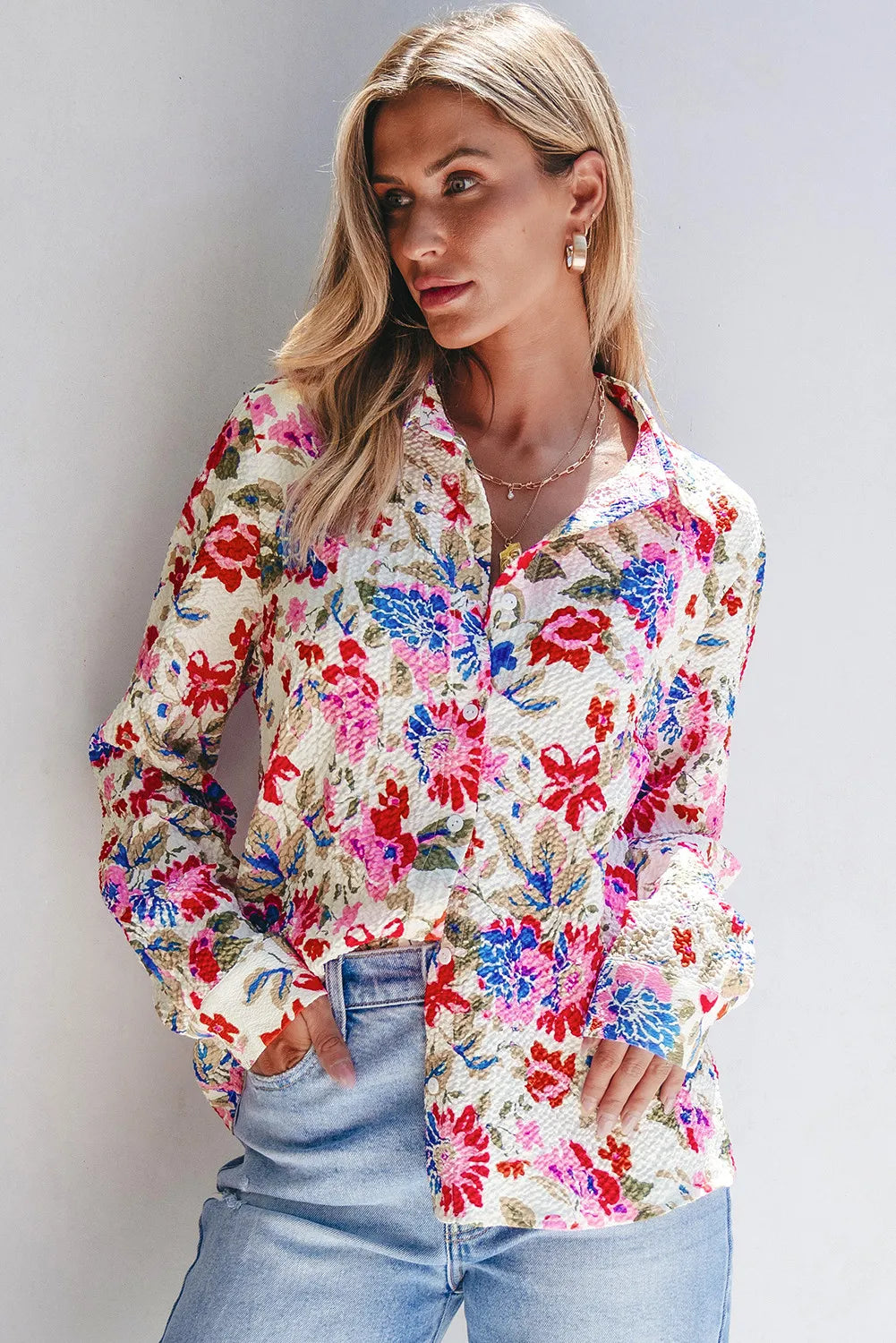Floral collared neck long sleeve shirt.