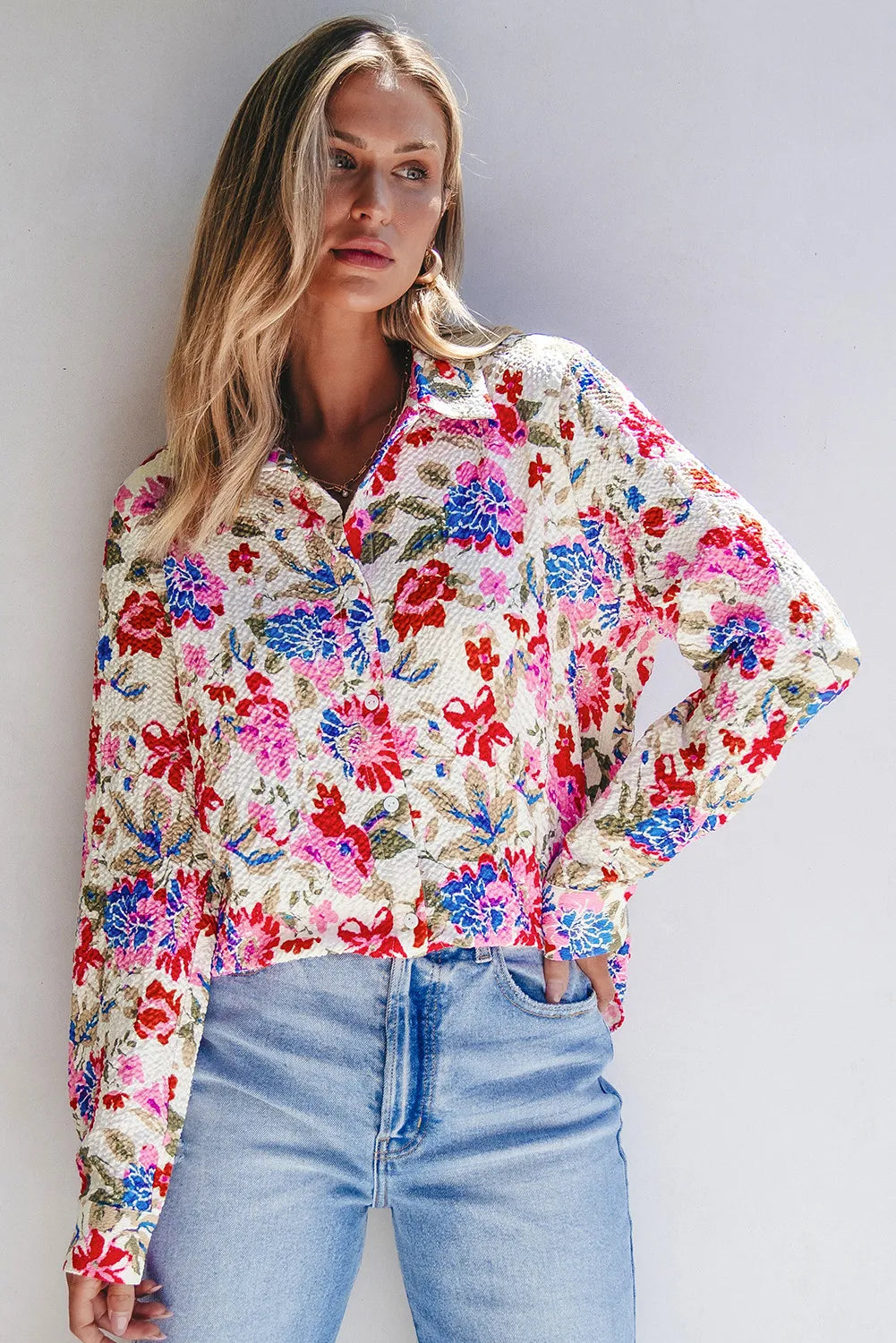 Floral collared neck long sleeve shirt.