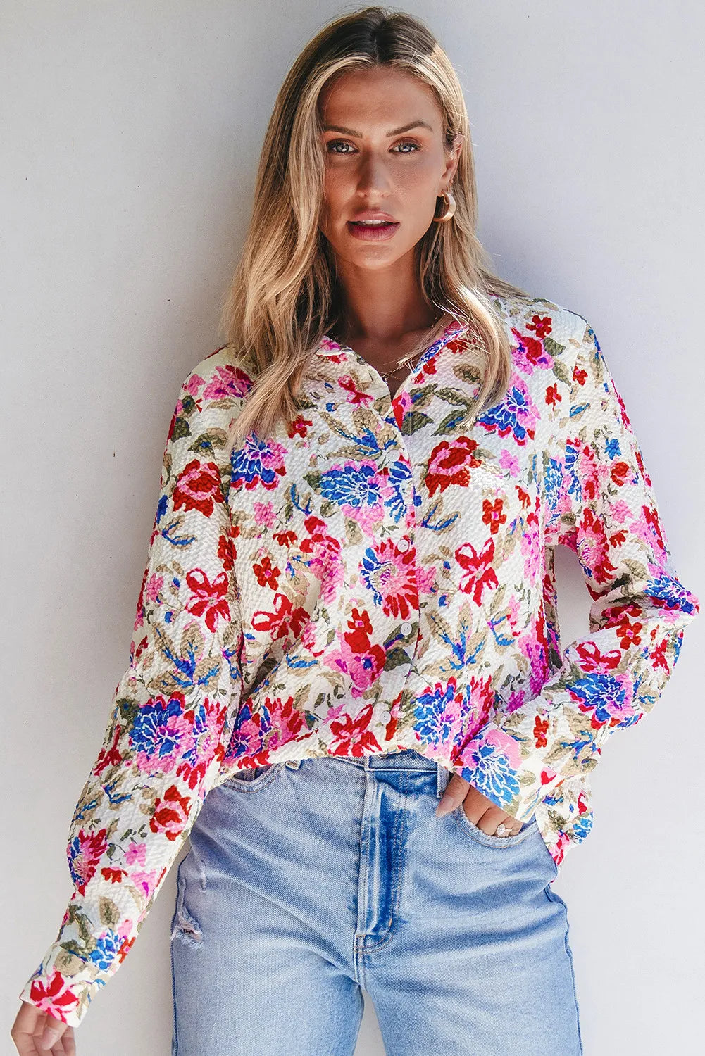 Floral collared neck long sleeve shirt.
