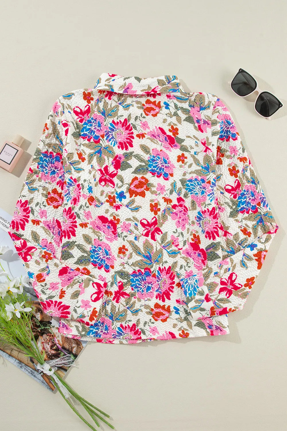 Floral collared neck long sleeve shirt.