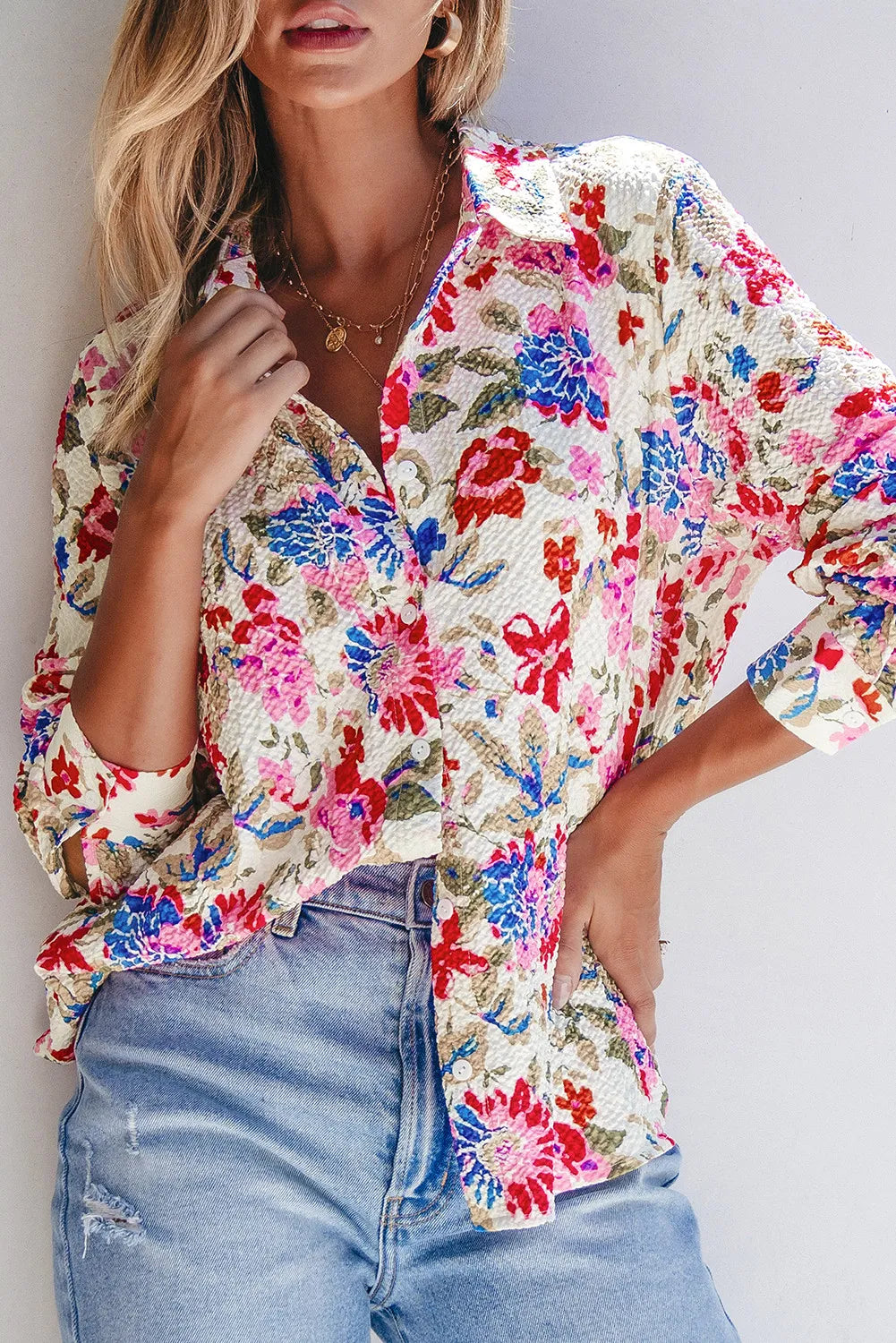 Floral collared neck long sleeve shirt.