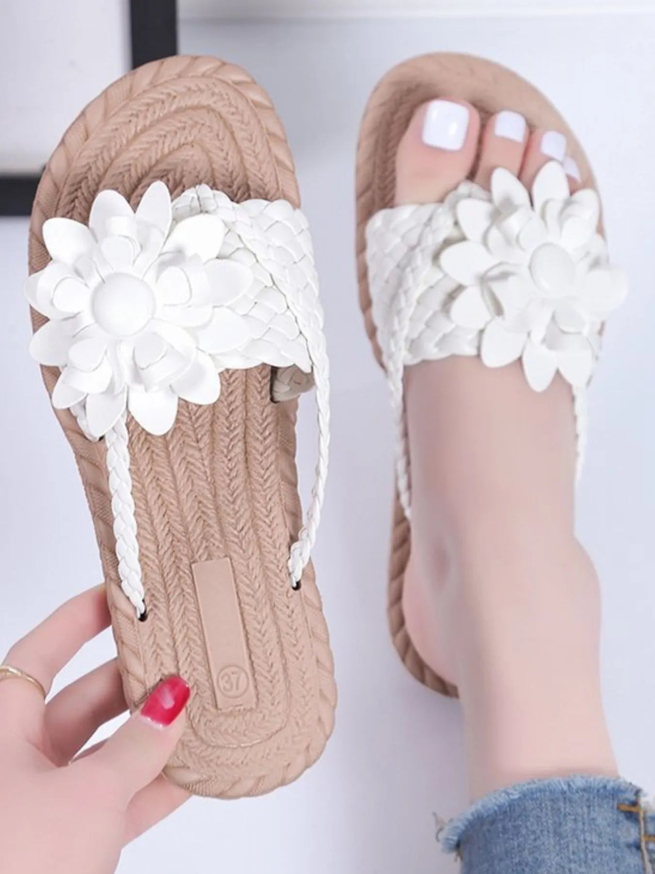 Floral embellished comfort slide sandals.