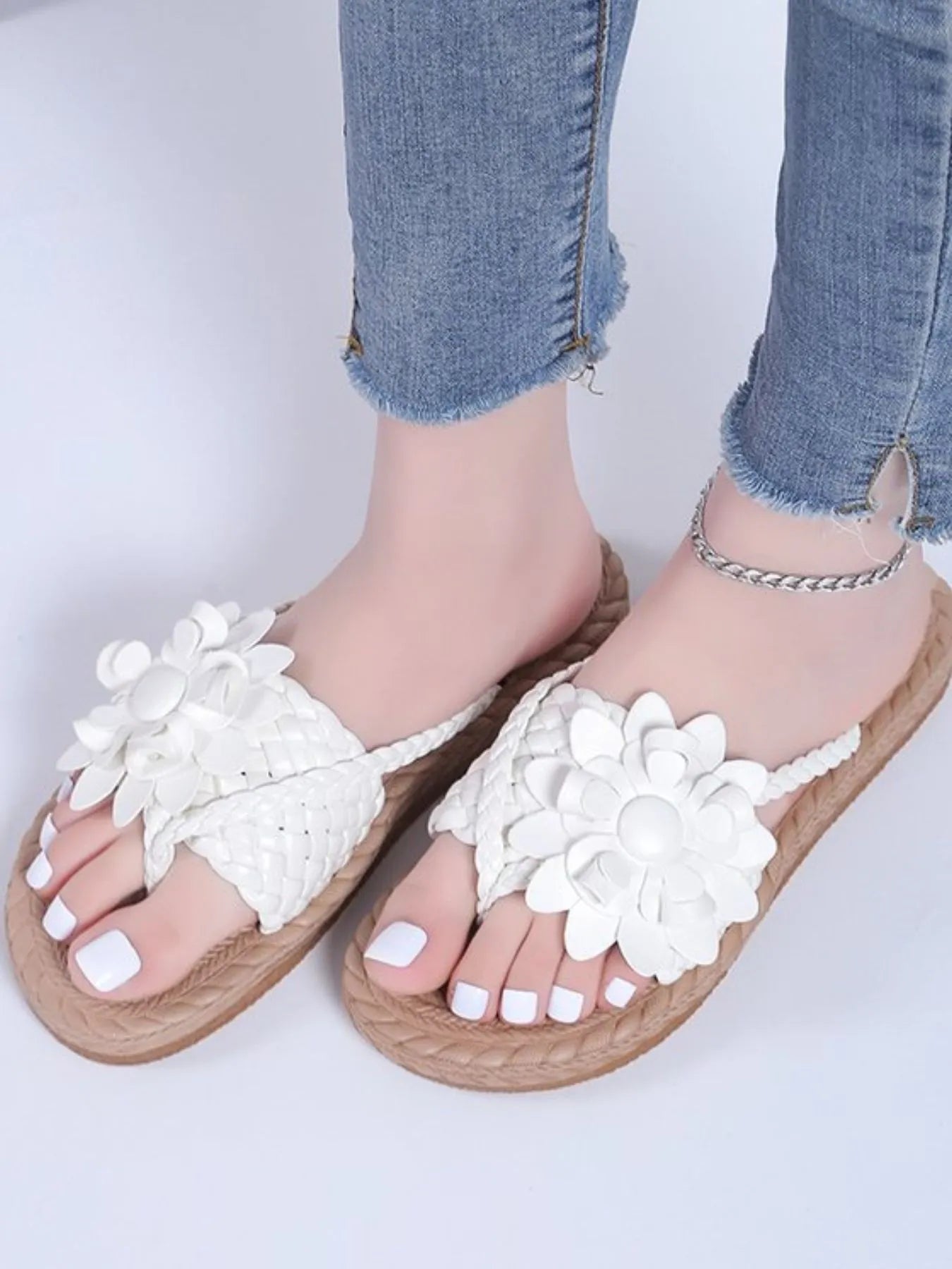 Floral embellished comfort slide sandals.