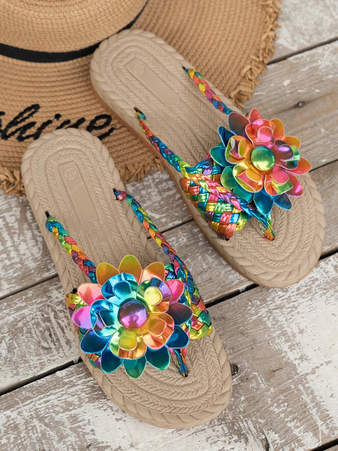 Floral embellished comfort slide sandals.