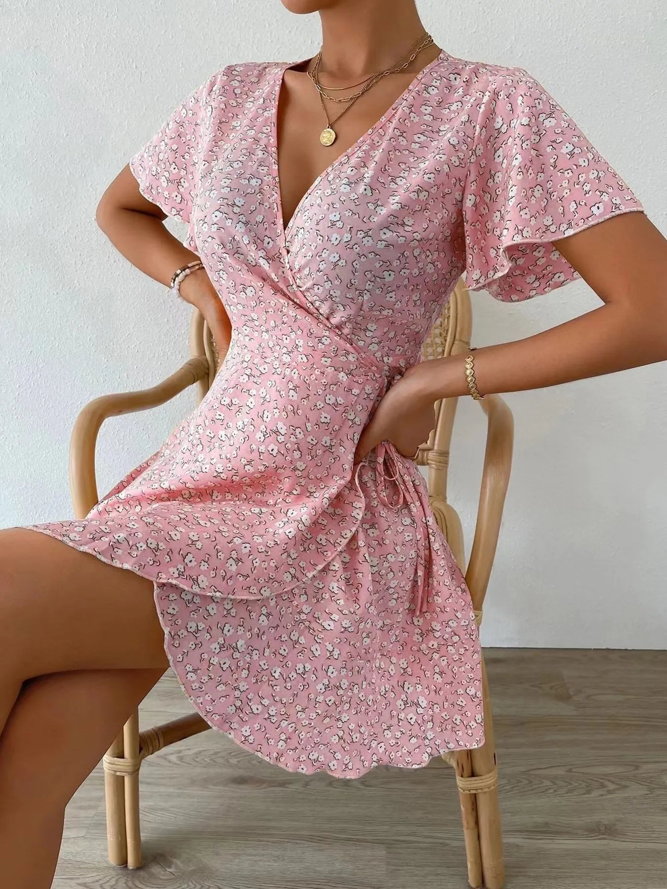 Floral Flutter Sleeve Wrap Mini Dress.