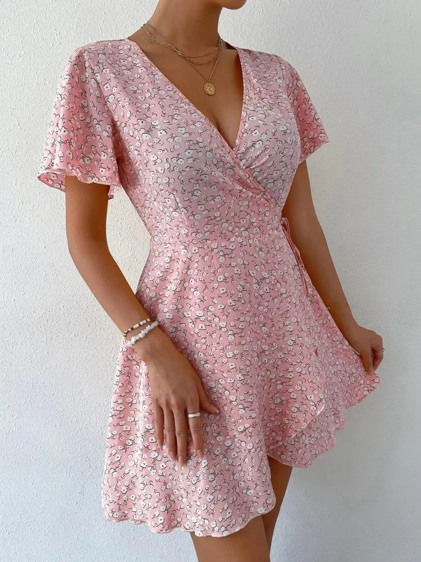 Floral Flutter Sleeve Wrap Mini Dress.