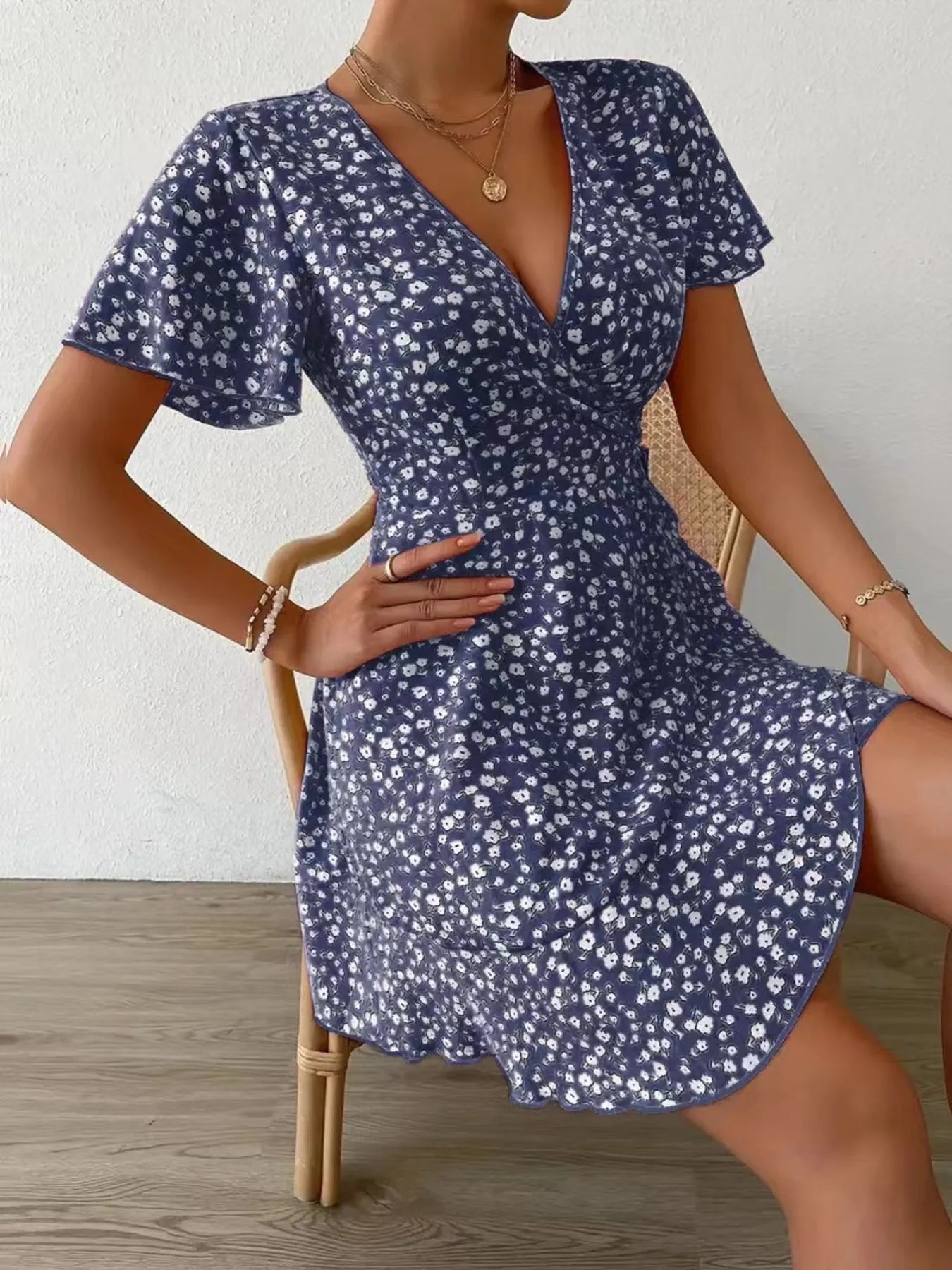 Floral Flutter Sleeve Wrap Mini Dress.