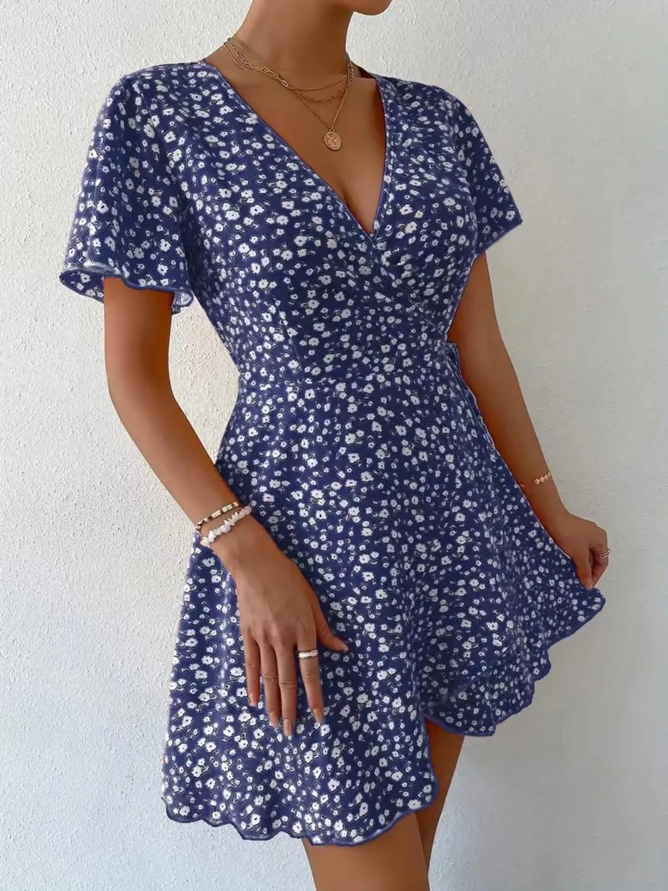 Floral Flutter Sleeve Wrap Mini Dress.
