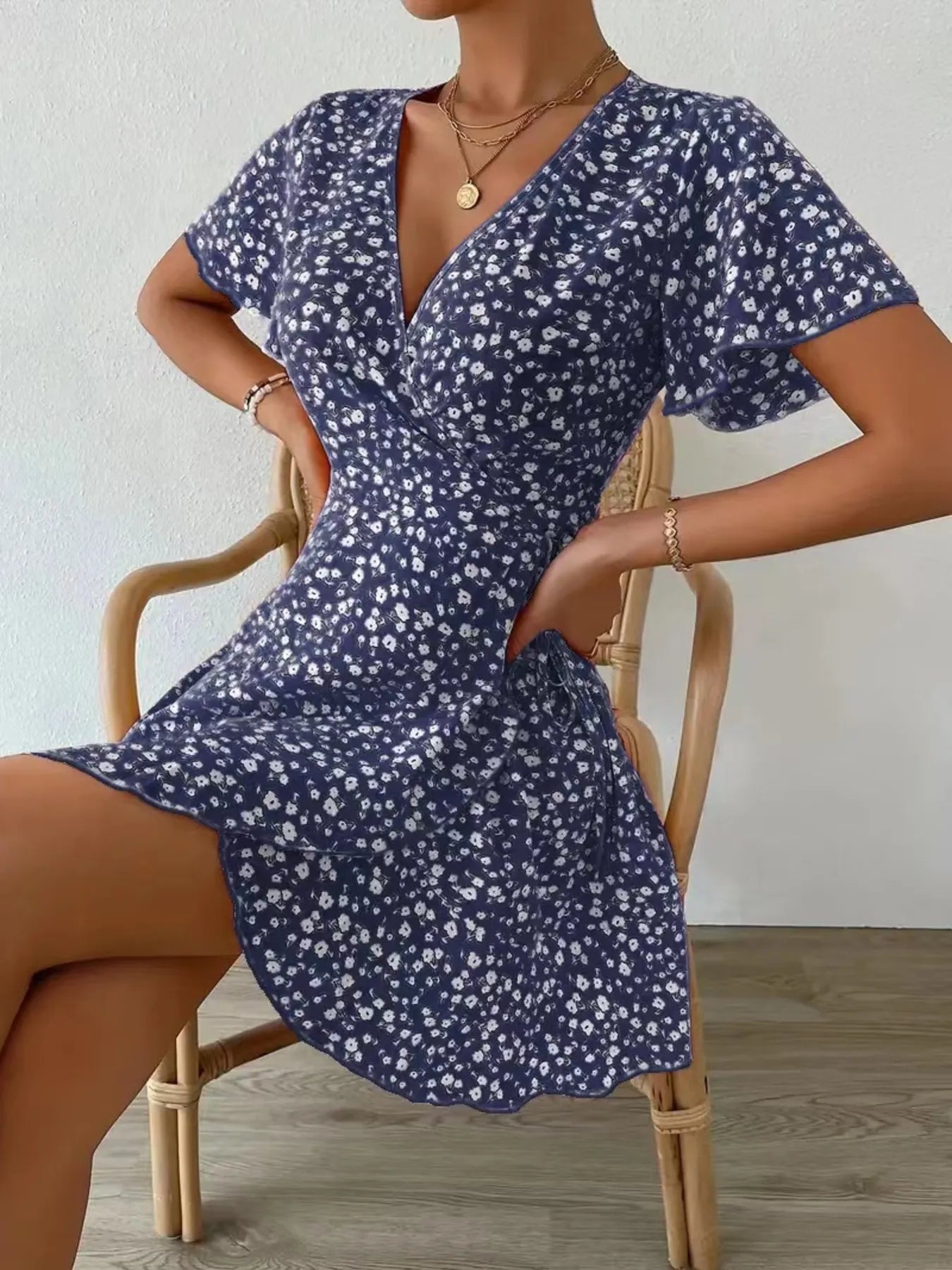 Floral Flutter Sleeve Wrap Mini Dress.