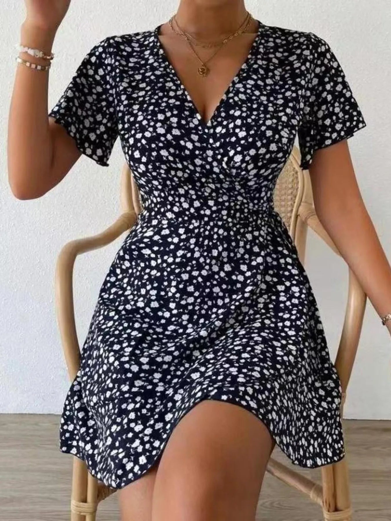 Floral Flutter Sleeve Wrap Mini Dress.