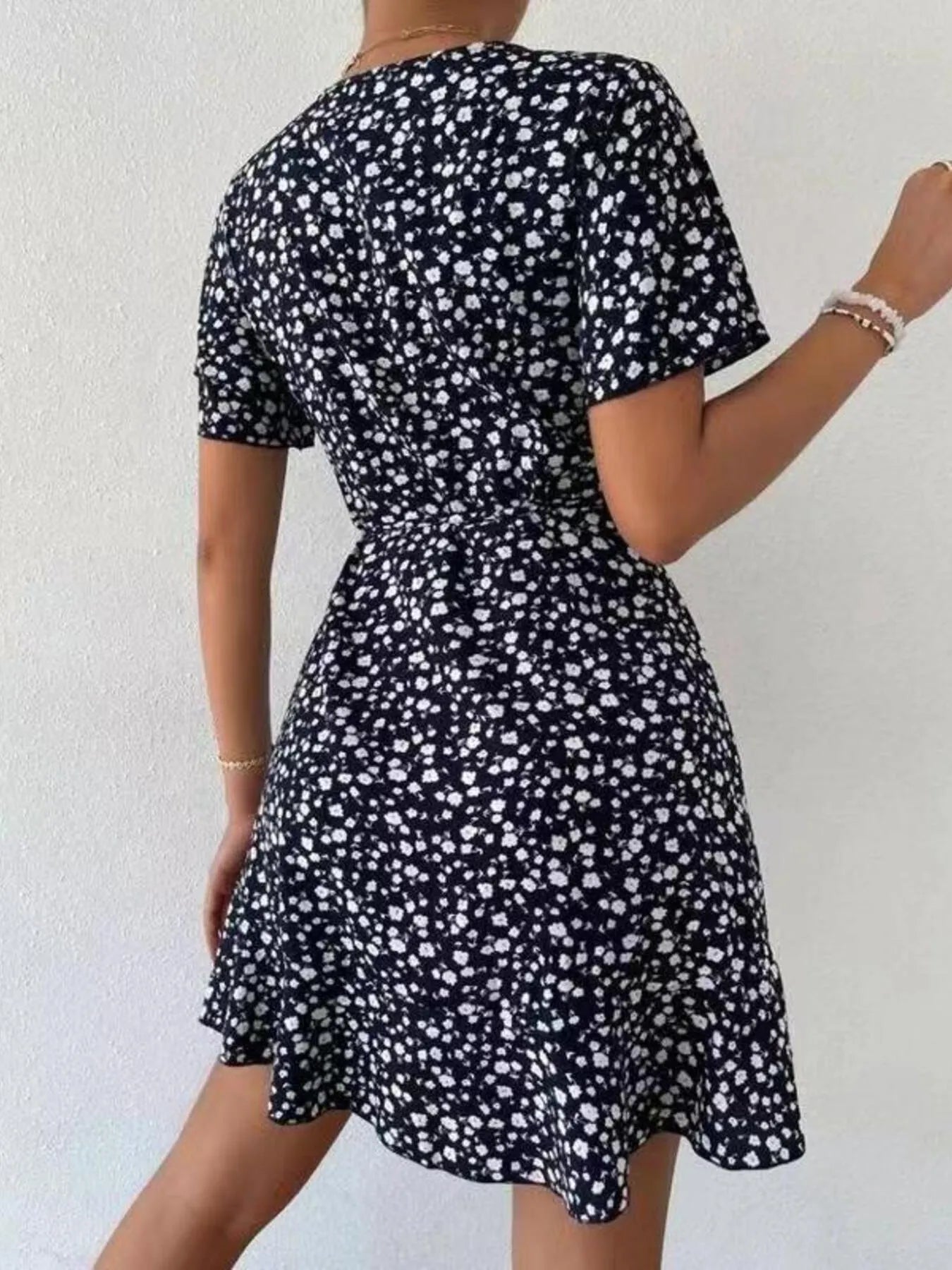 Floral Flutter Sleeve Wrap Mini Dress.