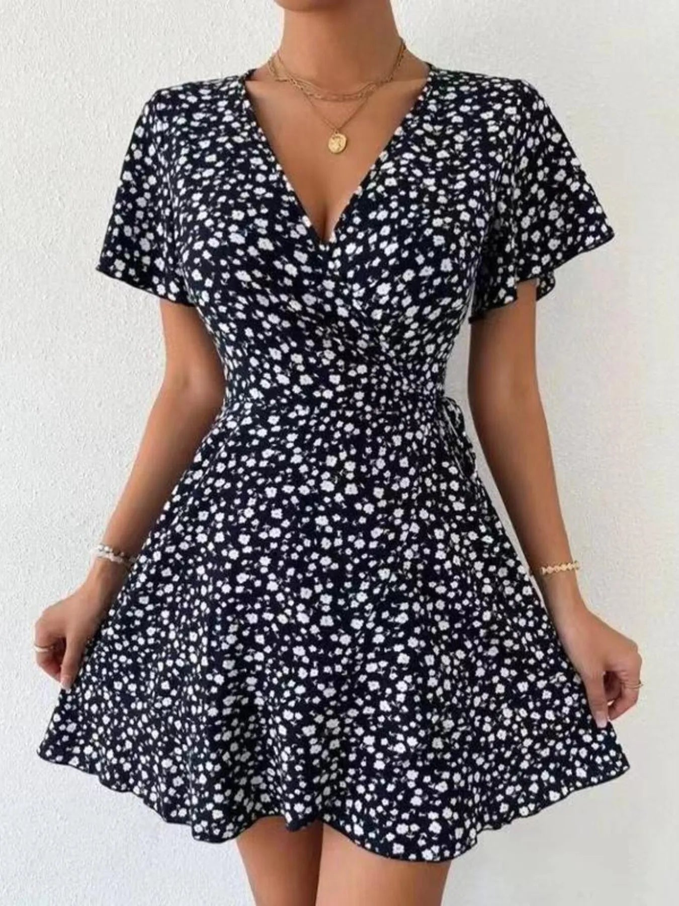 Floral Flutter Sleeve Wrap Mini Dress.